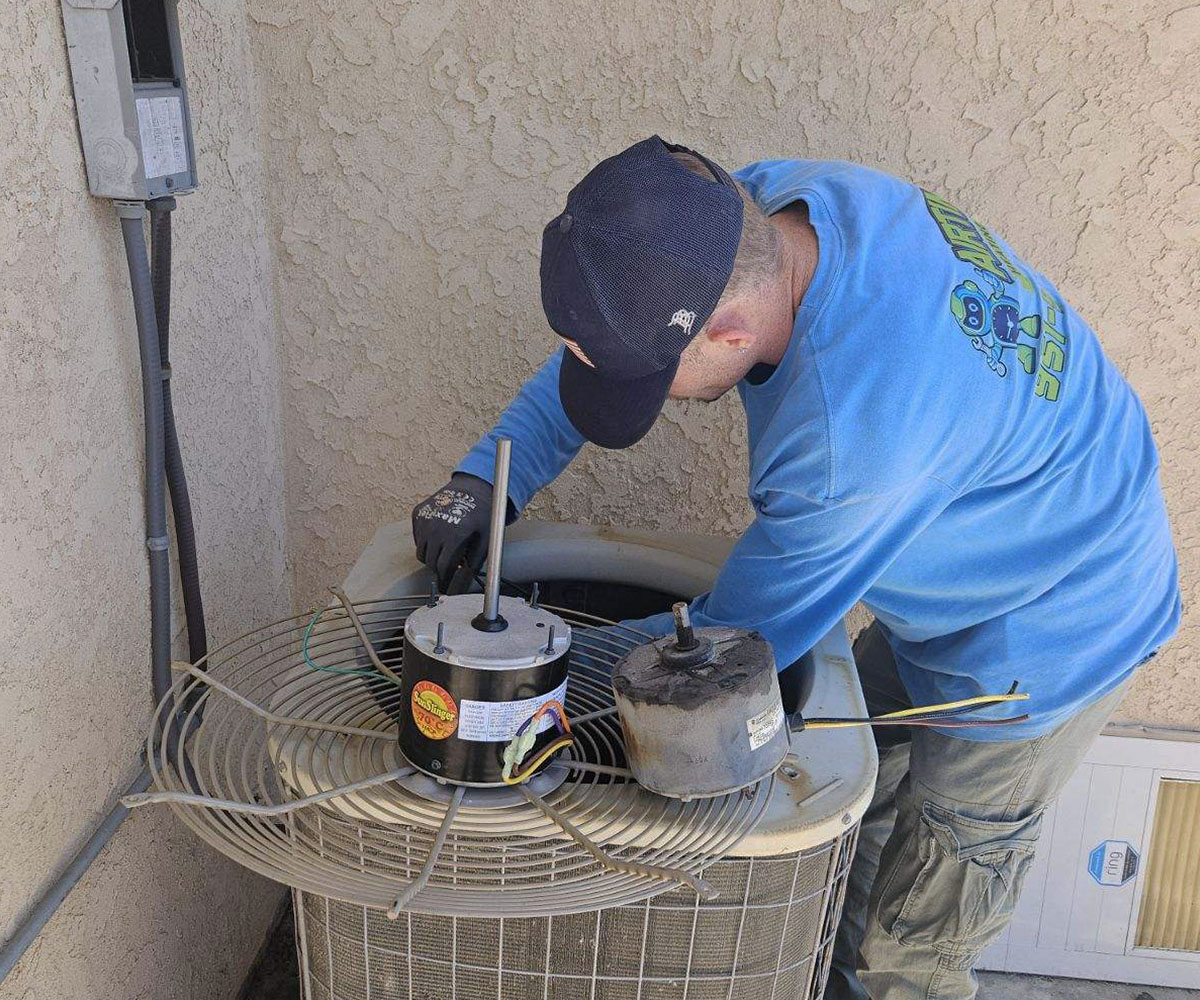 Airtime tech fixing AC unit
